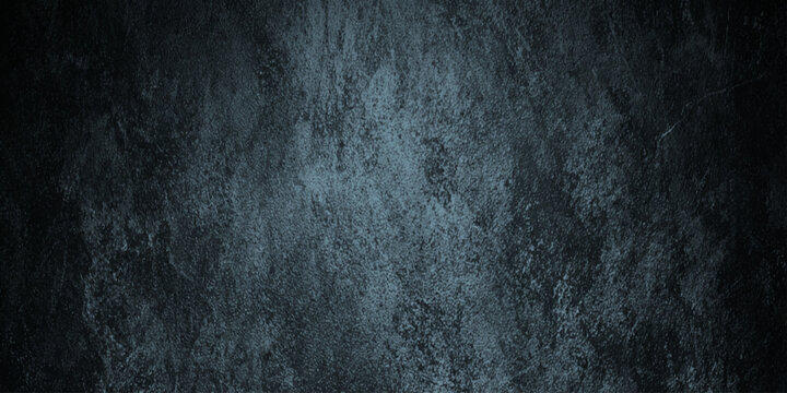A dark wall textured background of mottled teal and gray resembling aged weathered stone or a distressed wall