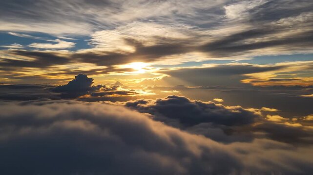 Aerial view of abstrack motion clouds at sunrise with dramatic light and shadow effects
