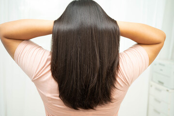 Fototapeta premium Woman with beautiful shine hair care treatment.