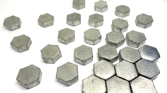 Rising side angle view of zinc hexagons.