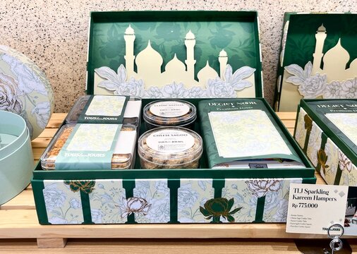 Jakarta, Indonesia - March 1st, 2026 - Tous Les Jours bakery Sparkling Kareem hampers set isolated on horizontal store counter background.