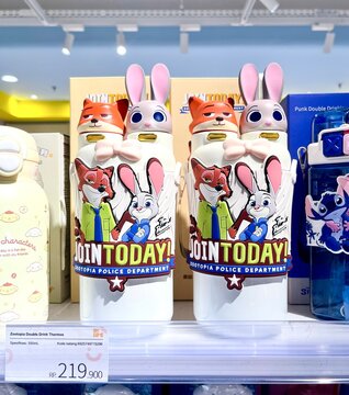 Jakarta, Indonesia - March 1st, 2026 - Zootopia drouble drink thermos bottle merchandise product isolated on indoor store shelf background.
