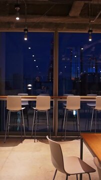 Modern Coworking Space with City View at Night Tokyo