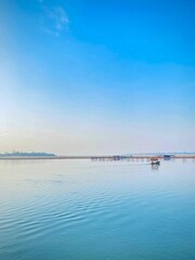 Obraz premium blue sky over the river