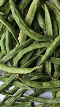Top View of Fresh Sem Ki Phalli (Broad Beans) &ndash; Green Vegetable Vertical Footage