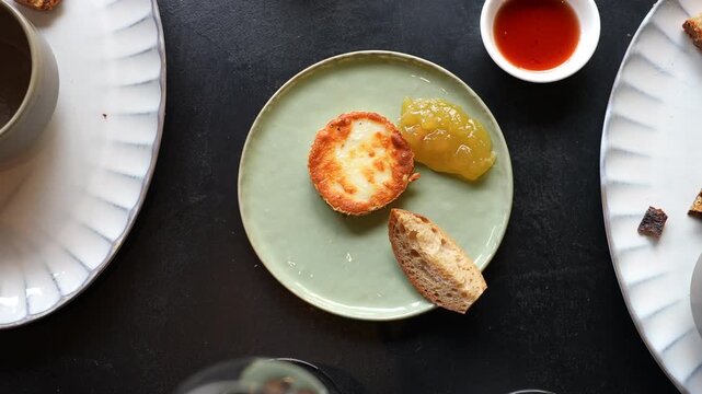 Roasted cheese with apple mush tasting in luxury restaurant