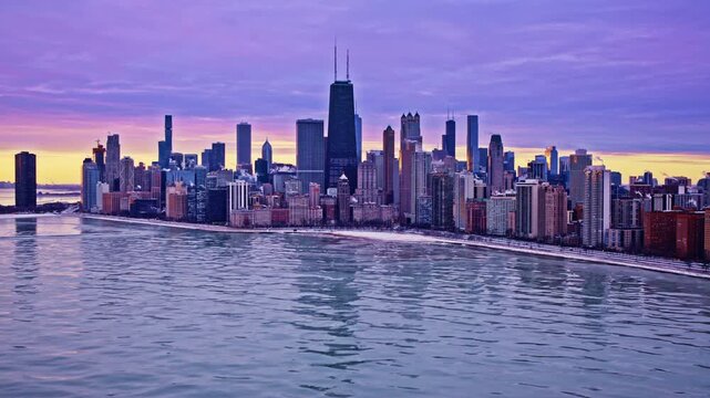 Sweeping sunrise drone footage of Chicago&rsquo;s Loop and waterfront skyline.