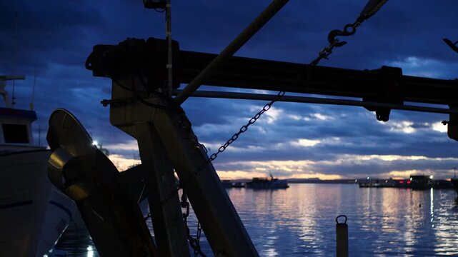 Drum and hauler of a fishing boat, at night, Santa Pola port, Spain.