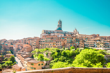 Naklejka premium Beautiful old town of Siena in Italy. Tourist destination in Italy.