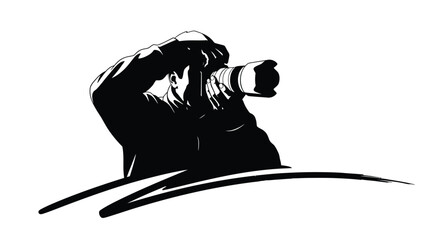 Photographer with camera capturing a moment in striking black graphic silhouette © Jewel