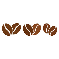 Obraz premium Three pairs of brown coffee beans on white background