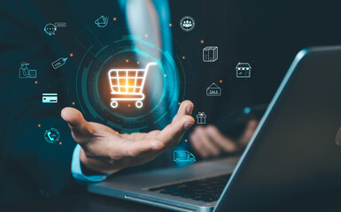 Businessman presenting shopping cart icon with retail symbols. Concept of e-commerce, online shopping, digital marketplace, and global logistics. © Love You Stock