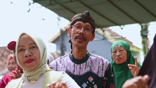Indonesian people enjoying street karaoke party singing and dancing