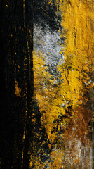 Naklejka premium Black and yellow smeared paint on dark marble stone abstract texture