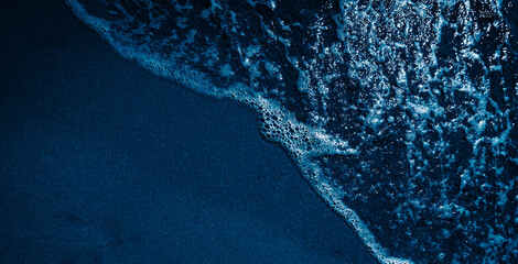 Navy blue sand beach  © avtk