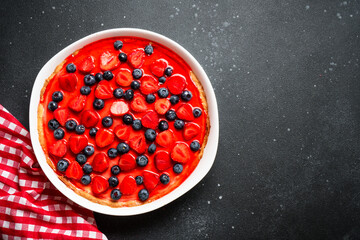 Tart with fresh berries and jelly.