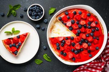 Tart with fresh berries and jelly.