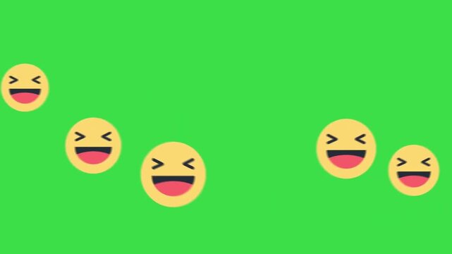Laughing emojis moving from right to left on green screen background for media