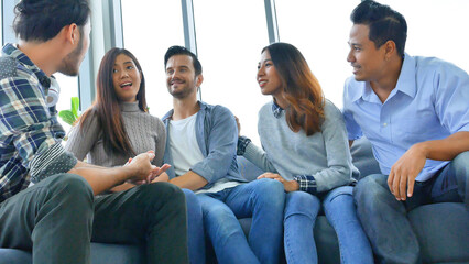 Diversity multi ethnic group brainstorming teams with business partner meeting and share ideas in conference room. Creative design colleague talking strategy plan use sticky notes post, present ideas