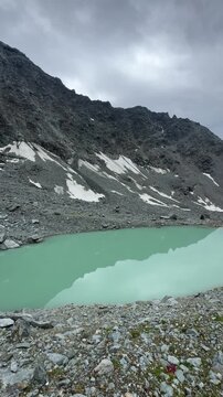 Alpine lake Lac du Petit Mont Fort in Pennine Alps, Valais, Switzerland