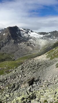 Snow-covered Col de Louvie mountain pass with alpine panorama, Haute Route, Pennine Alps, Switzerland