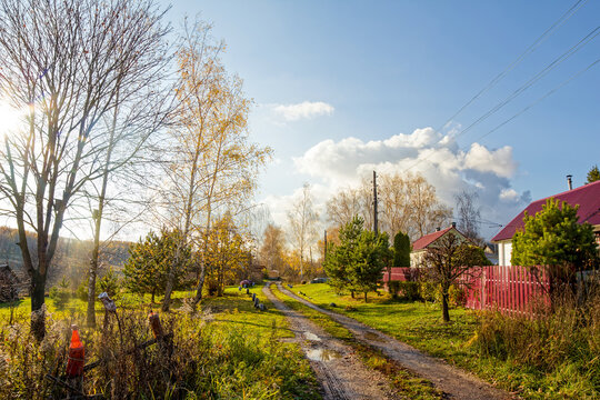 old wooden house in the village in autumn