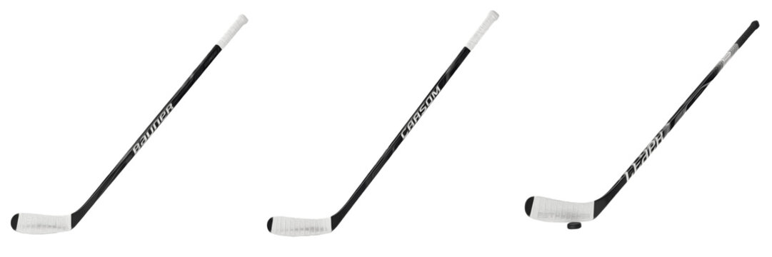 Set of three professional ice hockey sticks with white blades and black shafts isolated on white.