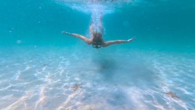 Underwater Woman Gives Thumbs Up With Starfish, Phu Quoc Vietnam Snorkel