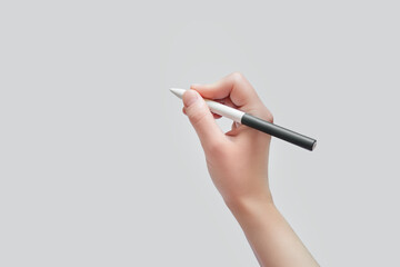Hand holding a stylus pen ready to write or draw