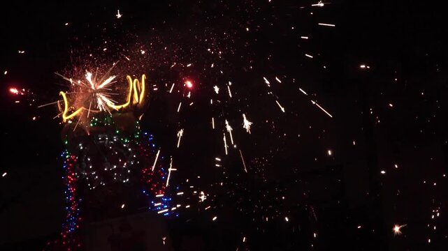 Chinese dragon performing at night.