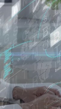 Vertical video: Man touching laptop and tilting chart, typing and analyzing business with HUD