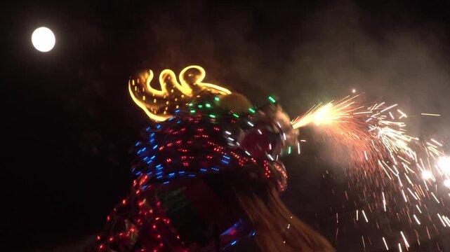 Chinese dragon performing at night.