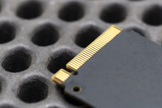 SDD stored on storage media shown on rubber mat with holes