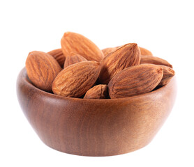 Almond nut isolated on white background. Brown almond nuts in wooden bowl. Clipping path.