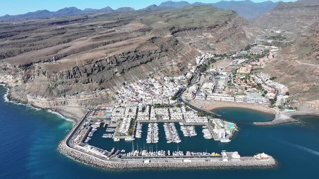 Aerial view of Puerto de Mogan and Playa de Mogan, Gran Canaria, Canary Islands, Spain