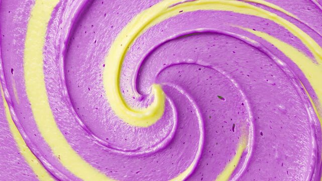 A soft abstract background for promos, motion videos, or concept videos. 4K video of a purple taro milk swirl texture. Can also be used to promote food and beverage products on social media.