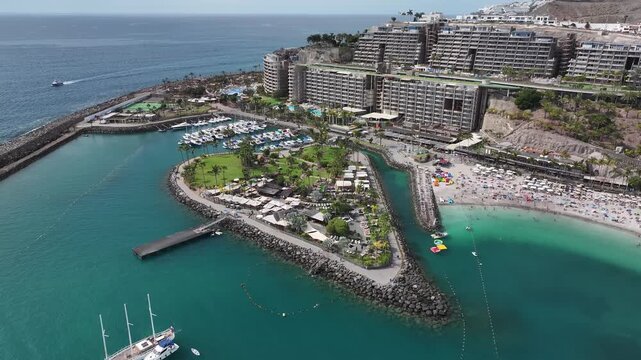 Aerial view of Playa Anfi del Mar and Isla Corazon de Anfi, Gran Canaria, Canary Islands, Spain