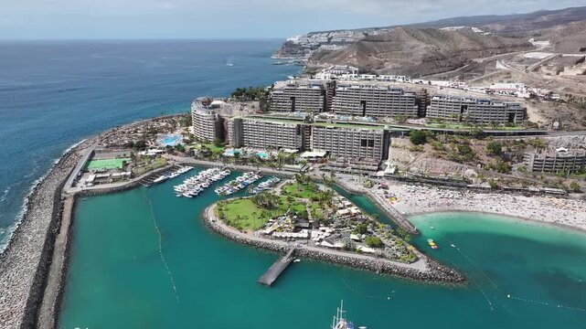 Aerial view of Playa Anfi del Mar and Isla Corazon de Anfi, Gran Canaria, Canary Islands, Spain