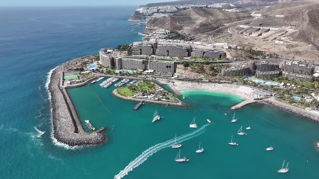 Aerial view of Playa Anfi del Mar and Isla Corazon de Anfi, Gran Canaria, Canary Islands, Spain