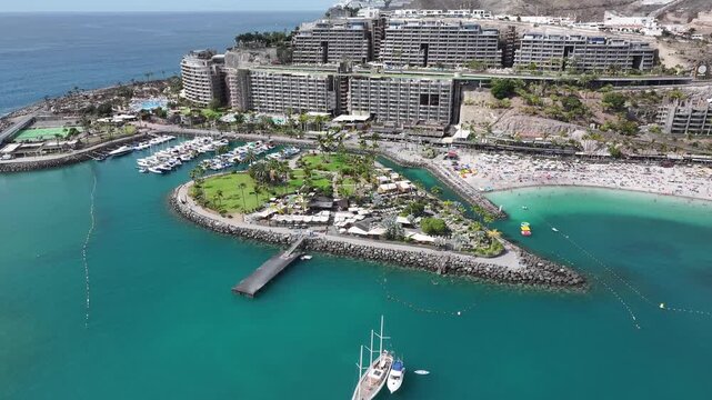 Aerial view of Playa Anfi del Mar and Isla Corazon de Anfi, Gran Canaria, Canary Islands, Spain