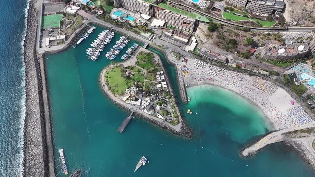 Aerial view of Playa Anfi del Mar and Isla Corazon de Anfi, Gran Canaria, Canary Islands, Spain