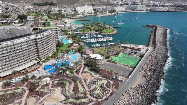 Aerial view of Playa Anfi del Mar and Isla Corazon de Anfi, Gran Canaria, Canary Islands, Spain