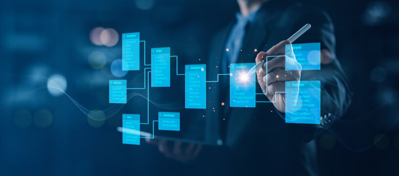 Businessman interacting with a relational database interface, illustrating structured data tables, system architecture, and information management for enterprise technology and analytics solutions.