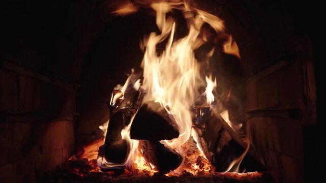 Warm flames dancing in a cozy fireplace during winter nights