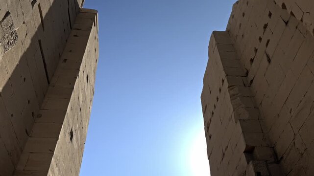 Located at the Karnak Temple Complex in Luxor, Egypt, this clip captures the sheer verticality of the temple's pylons.
