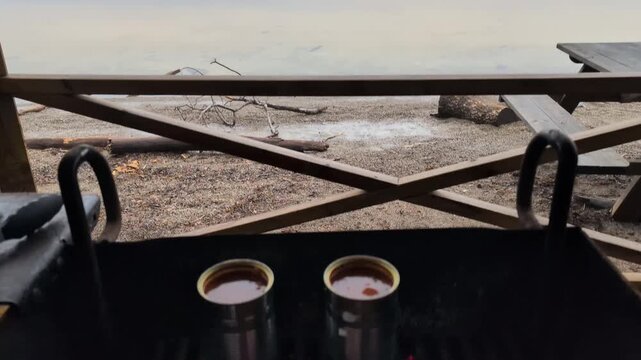 Lighting a fire and cooking canned goulash soup and pouring it up in bowls with cheese bread in early spring. shot in
60fps. this video is 23,976 slowmotion so you can decide how you want it
