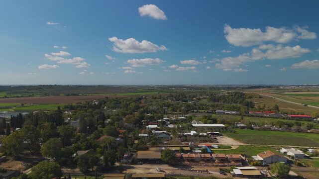 Tal Shahar agricultural lands stretching towards the Kharuvit Forest, capturing the essence of the Shephelah region's natural and farmed beauty