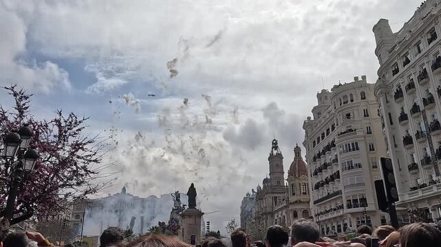 Fireworks erupt in Plaza del Ayuntamiento during Las Fallas festival in Valencia, Spain