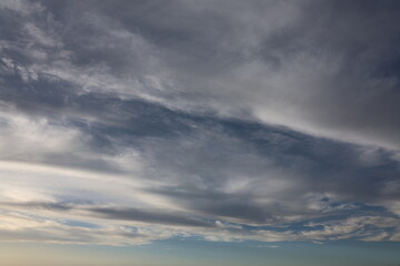 Fototapeta premium Dramatic sunset sky with colorful clouds at dusk. Nature background and texture - sky replacement