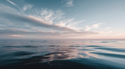 Fototapeta premium Wide Ocean Surface Under a Pastel Sky With Clear Horizon and Space for Corporate Designs and Banners